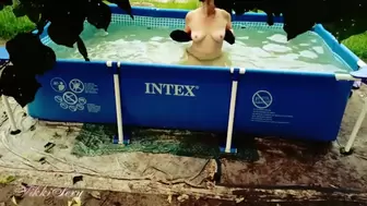 Hot MILF Shows her Titties and Snatch in the Pool
