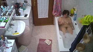 My wife takes a bath and shaves