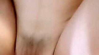 A cam in the restroom catches an Oriental woman urinating.