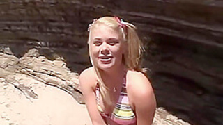 Skinny teenie lezbian fingered on the beach