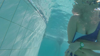 Sexy teeny flashes her fresh saggy titties in a public pool