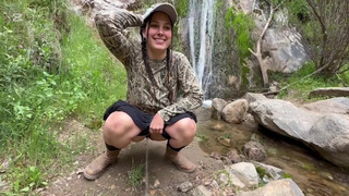 Pissing in a waterfall