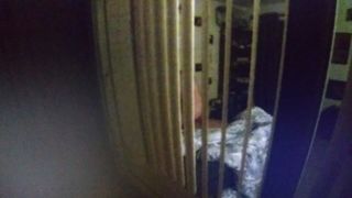 Filming wife cheating through window