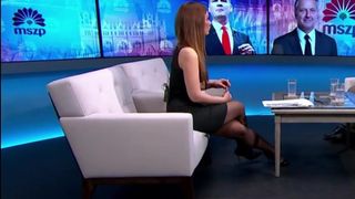 Long legs in black pantyhose on TV 13