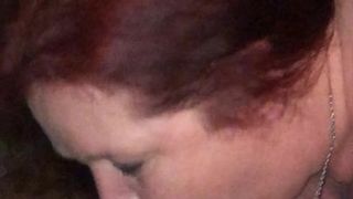 Wife affectionately sucking a black cock
