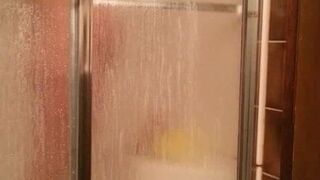 Secretly Watching Camera caught her masturbating and cumming in shower