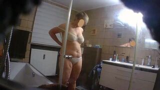 Watching my wifey undressing in the bathroom voyeur web camera