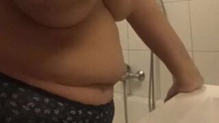 Saggy melons housewife brushes her teeth