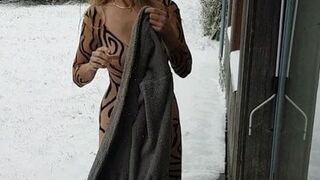 teasing the cat in snow